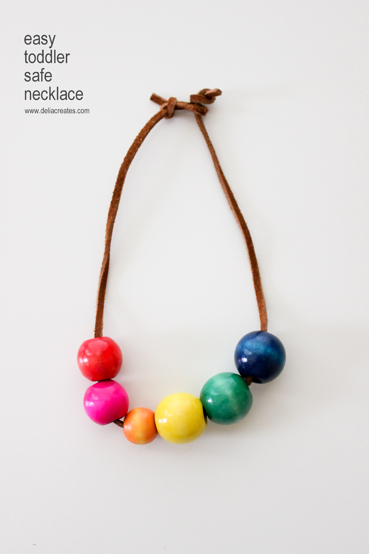 DIY Toddler Safe Necklaces. They are fun to make and have a unique safety clasp in the back! || Delia Creates