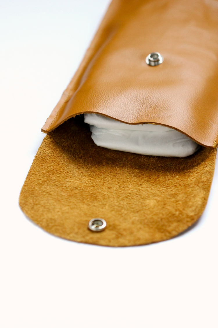 Make this simple leather diaper clutch using this really easy tutorial.