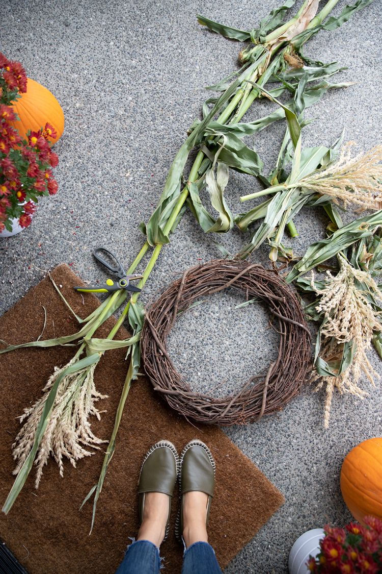 Fresh Cornstalk Fall Wreath DIY // www.deliacreates.com // Make this wreath from fresh cornstalks and a grapevine wreath.