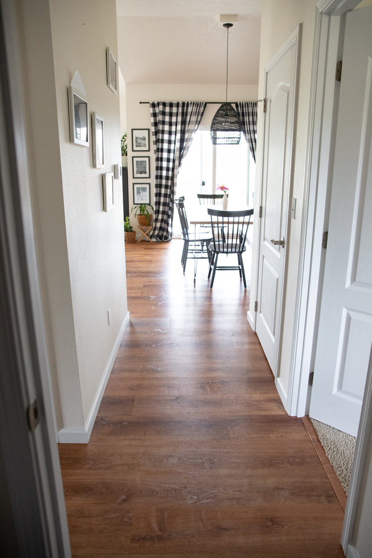 How We Installed LifeProof flooring in 75% of our house ourselves// www.deliacreates.com