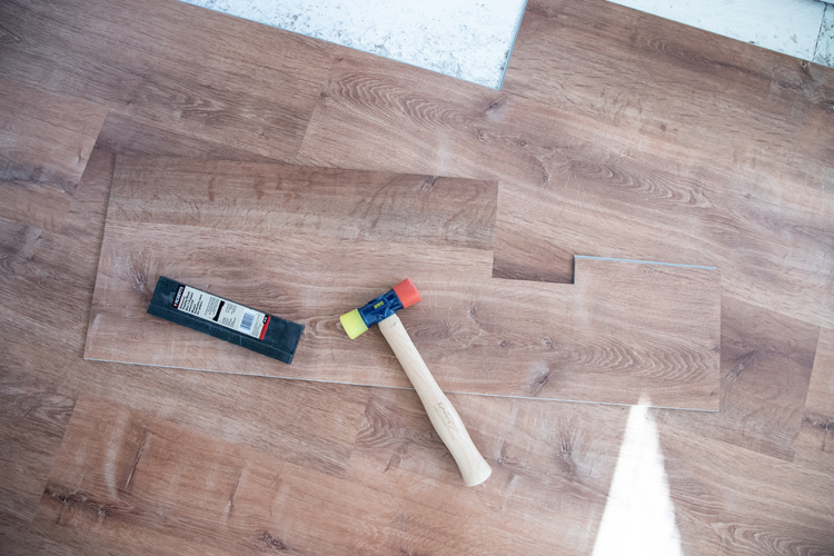 How We Installed LifeProof flooring in 75% of our house ourselves// www.deliacreates.com