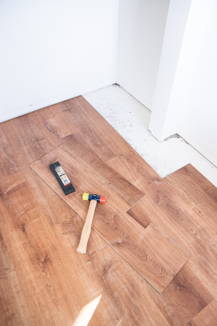 How We Installed LifeProof flooring in 75% of our house ourselves// www.deliacreates.com