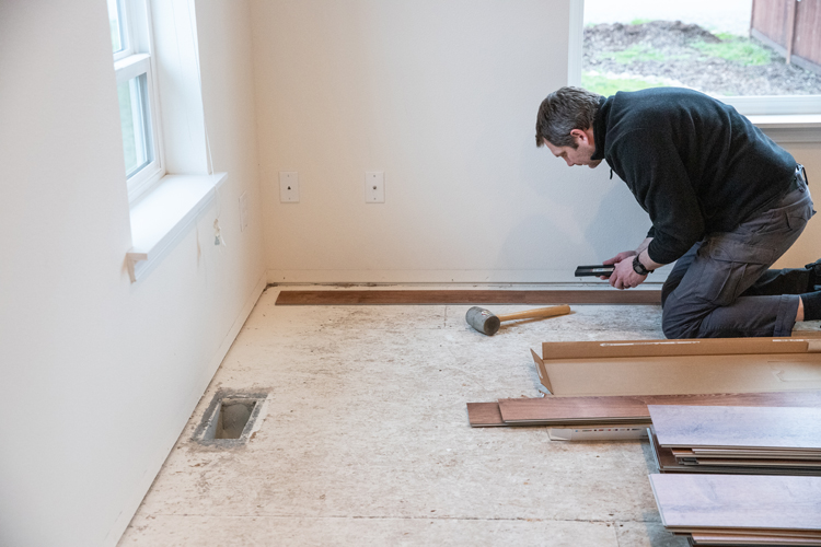 How We Installed LifeProof flooring in 75% of our house ourselves// www.deliacreates.com