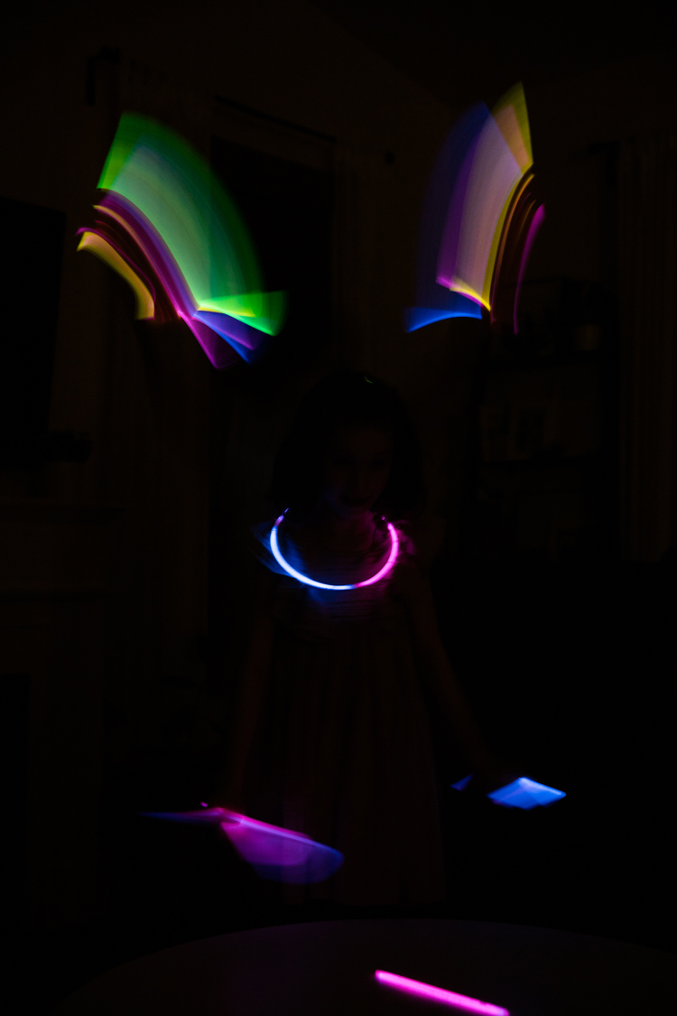 7 Easy ways to make New Year's Eve fun for kids and families! // Have a glow stick dance party! // www.deliacreates.com