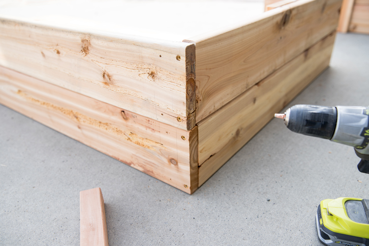 How To Make Cedar Raised Garden Beds // www.deliacreates.com// step by step tutorial with pictures