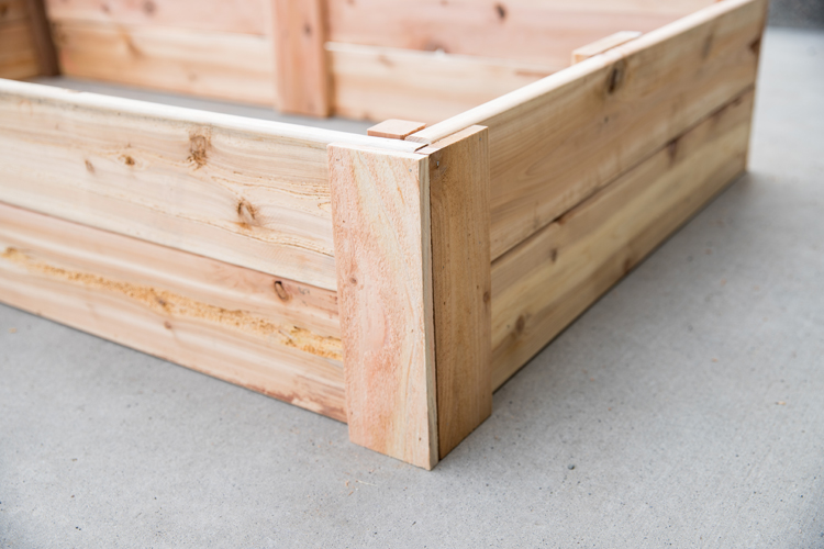 How To Make Cedar Raised Garden Beds // www.deliacreates.com// step by step tutorial with pictures