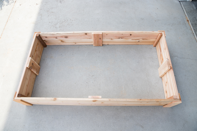 How To Make Cedar Raised Garden Beds // www.deliacreates.com// step by step tutorial with pictures