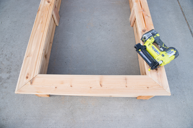 How To Make Cedar Raised Garden Beds // www.deliacreates.com// step by step tutorial with pictures