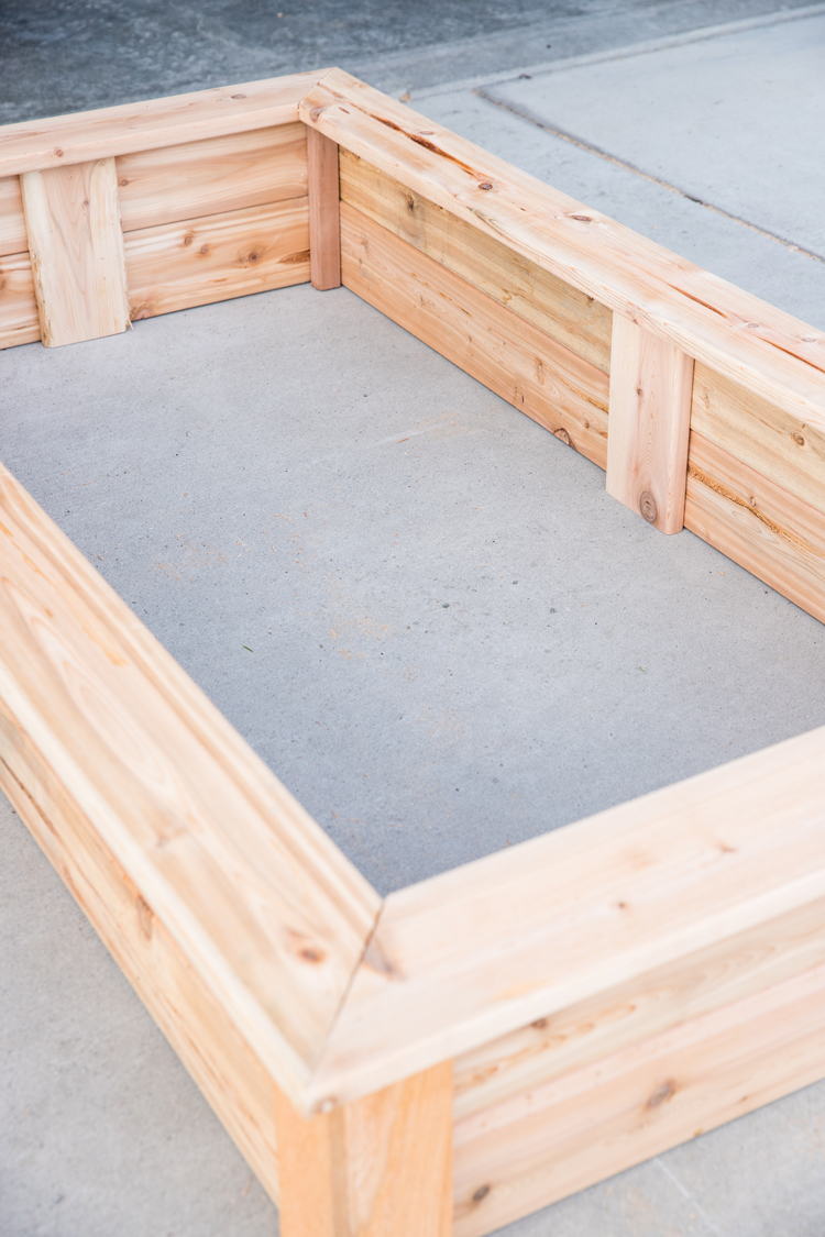 How To Make Cedar Raised Garden Beds // www.deliacreates.com// step by step tutorial with pictures