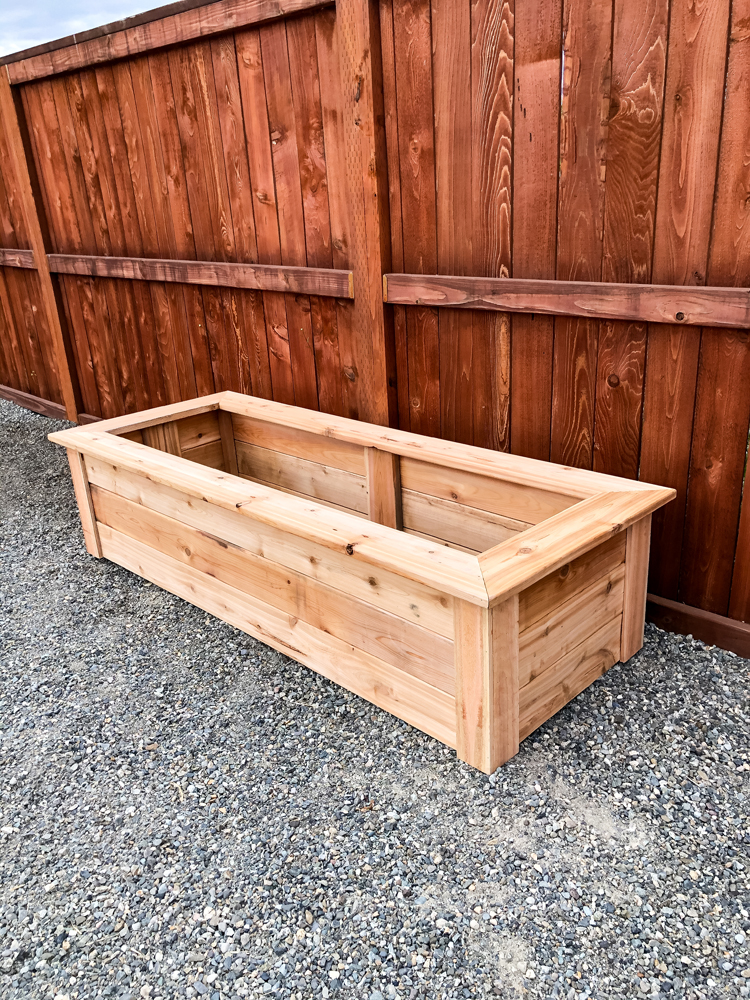 How To Make Cedar Raised Garden Beds // www.deliacreates.com// step by step tutorial with pictures, and tips on where to buy inexpensive lumber