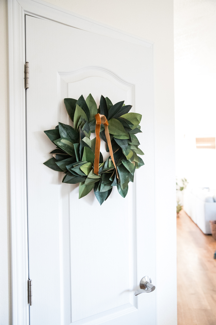 Wrapping Paper Wreath - video tutorial // www.deliacreates.com