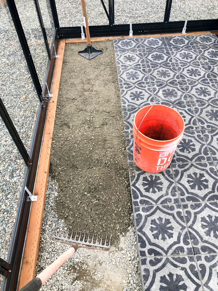 DIY Stenciled Paver Greenhouse Flooring // www.deliacreates.com