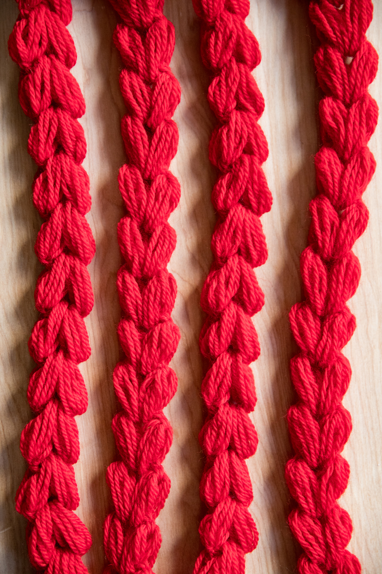 Puffy Heart Crochet Garland Tutorial // www.deliacreates.com