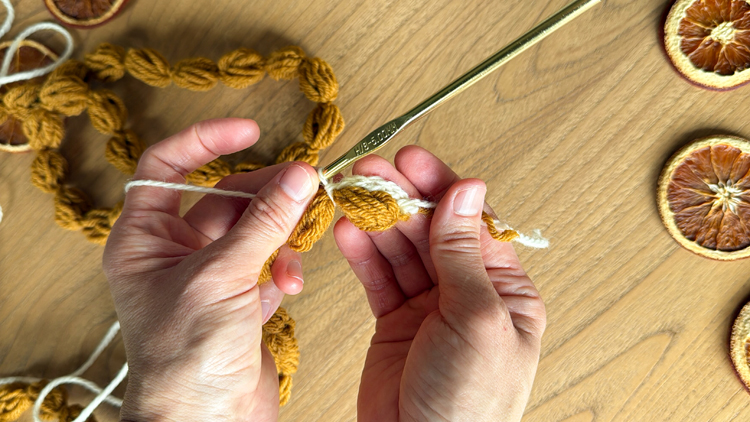 Chains + Puffs Crochet Garland // free pattern and video tutorial at www.deliacreates.com