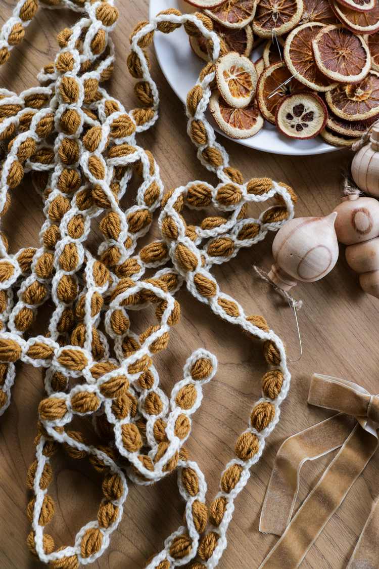 Chains + Puffs Crochet Garland // free pattern and video tutorial at www.deliacreates.com