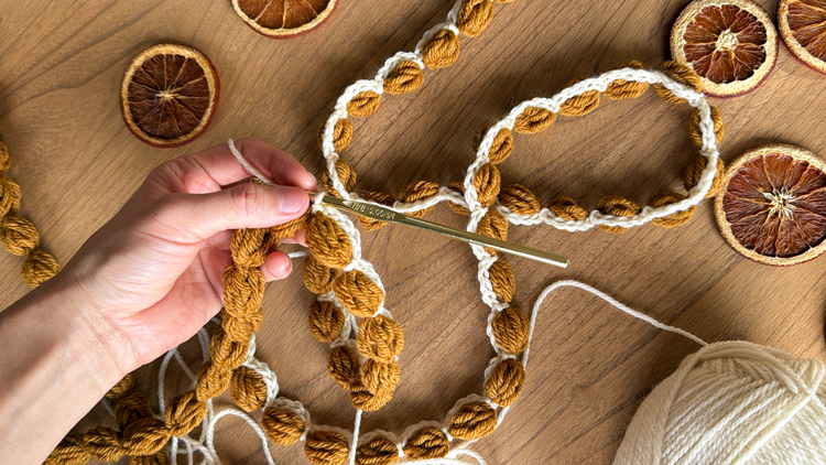 Chains + Puffs Crochet Garland // free pattern and video tutorial at www.deliacreates.com