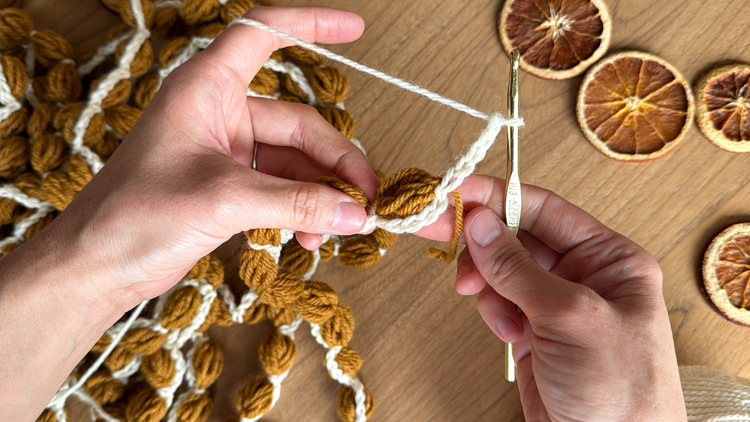 Chains + Puffs Crochet Garland // free pattern and video tutorial at www.deliacreates.com
