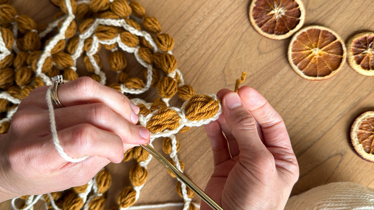 Chains + Puffs Crochet Garland // free pattern and video tutorial at www.deliacreates.com