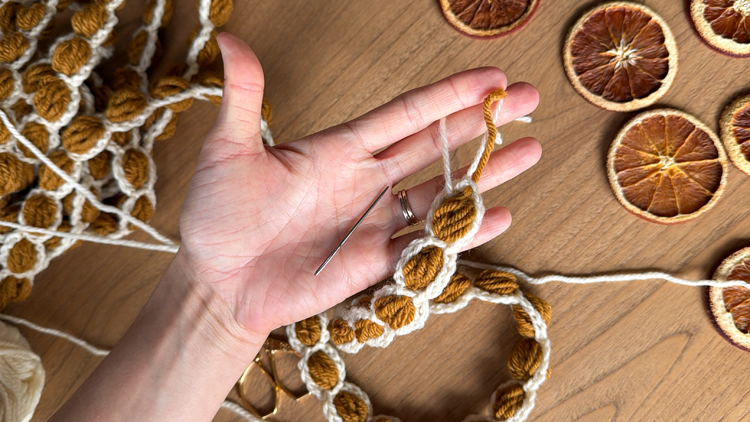 Chains + Puffs Crochet Garland // free pattern and video tutorial at www.deliacreates.com