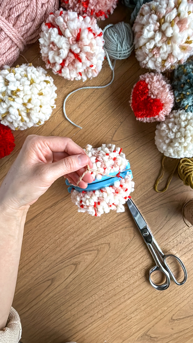 How To Make Pompoms That Don't Fall Apart // www.deliacreates.com