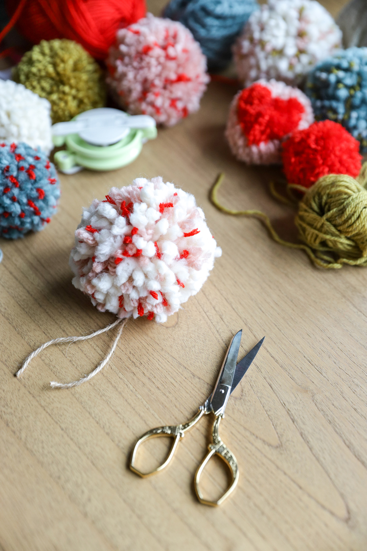 How To Make Pompoms That Don't Fall Apart // www.deliacreates.com