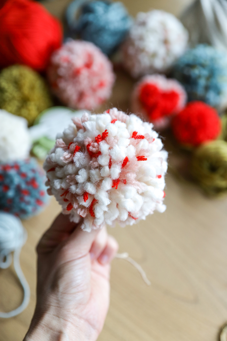 How To Make Pompoms That Don't Fall Apart // www.deliacreates.com